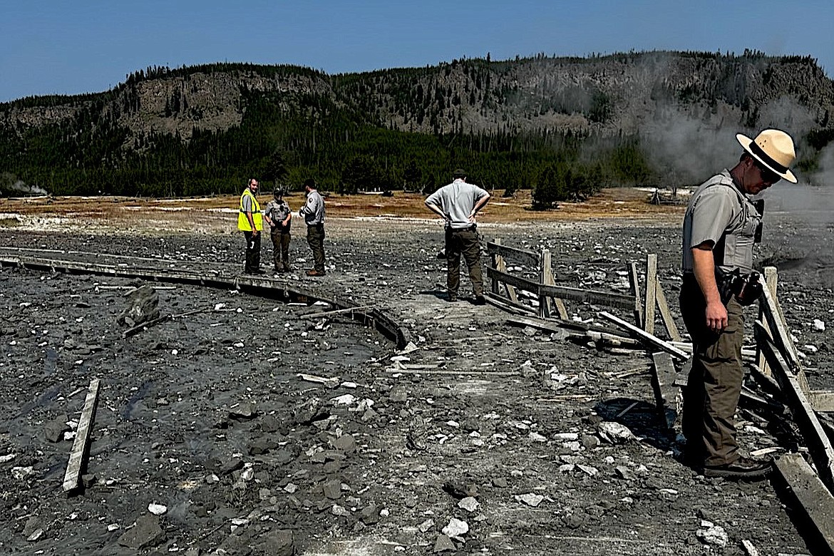 Yellowstone National Park staff assess the damage to Biscuit Basin boardwalks after a hydrothermal explosion Tuesday, July 23, 2024. (NPS photo)