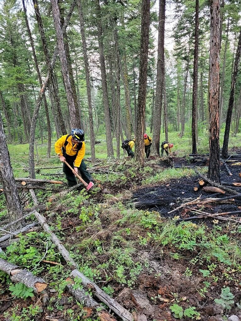 Whitefish Fire Department firefighters work with Montana DNRC crews to build a fire line on Lion Mountain after a small fire cropped up Saturday, July 20, 2024. (Whitefish Fire Department photo)