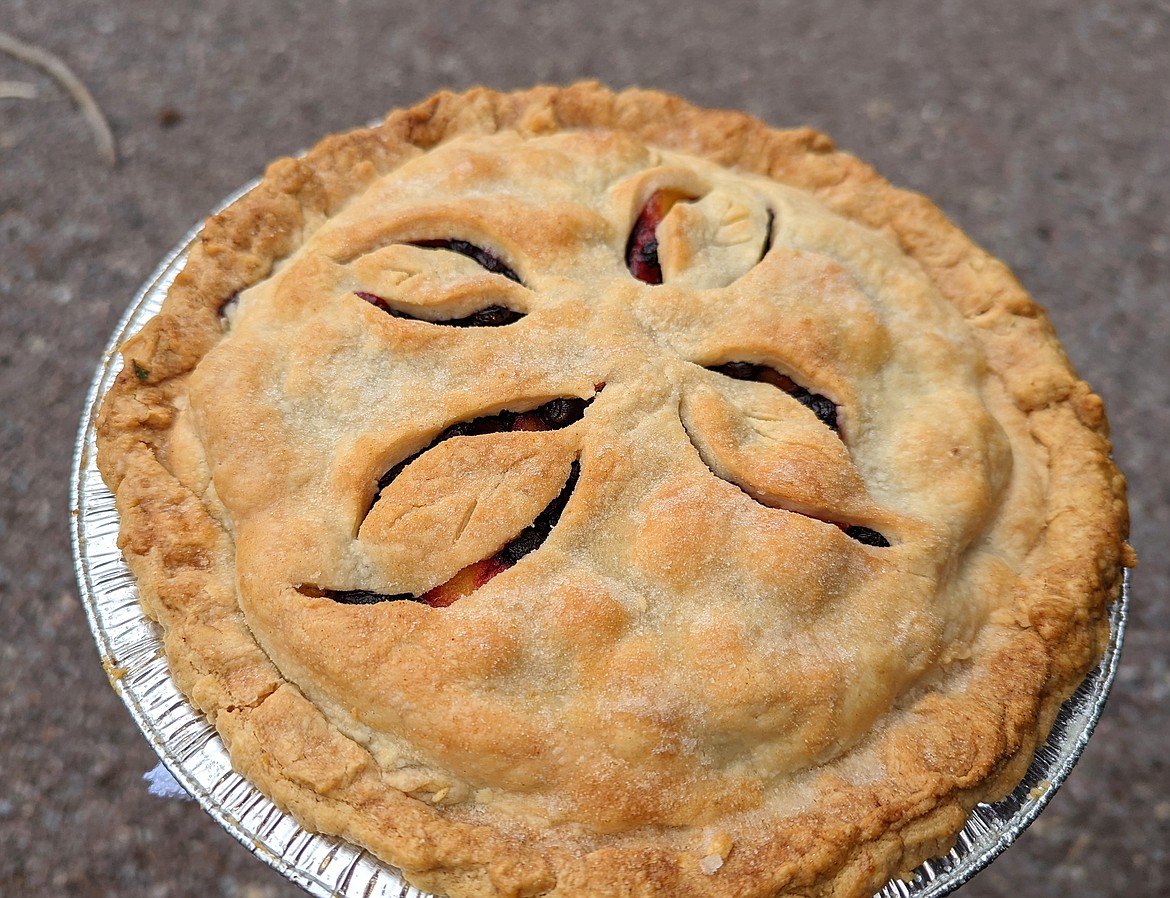 The huckleberry peach pie served with ice cream is a feature of the dessert menu at the Laughing Horse Lodge. (Courtesy photo)