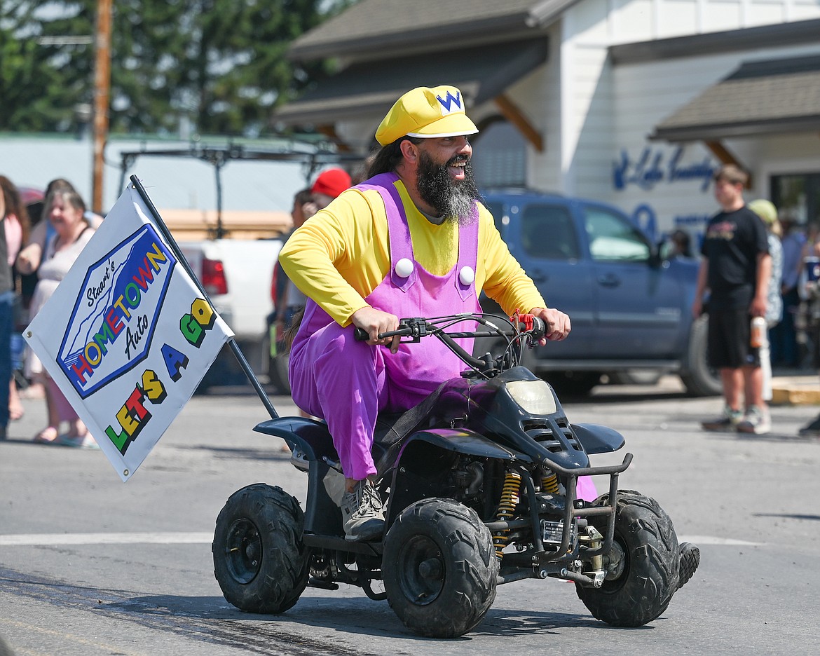 Stuart's Hometown Auto took the grand prize in the Good Old Days parade with an assortment of quirky characters and vehicles. (Christa Umphrey photo)