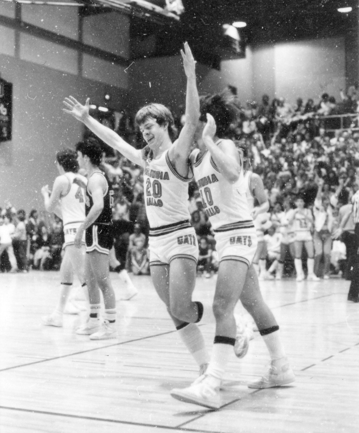 Cary Finberg (20) celebrates after the Wildcats notched a big win in the regular season against Flathead in 1984. Finberg had 16 points in the win, which ended a 5-year losing streak to the Braves. Columbia Falls was AA school at the time. (Scott Crandell photo)