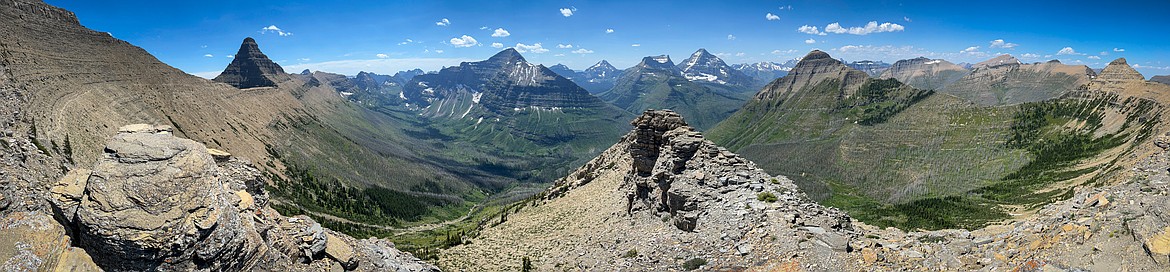 Panorama from the Continental Divide Trail showing Flinsch Peak, Mount Helen, Mount Phillips, Mount Pinchot, Tinkham Mountain, Razoredge Mountain, Triple Divide Peak and McClintock Mountain in Glacier National Park on Sunday, July 14. (Casey Kreider/Daily Inter Lake)