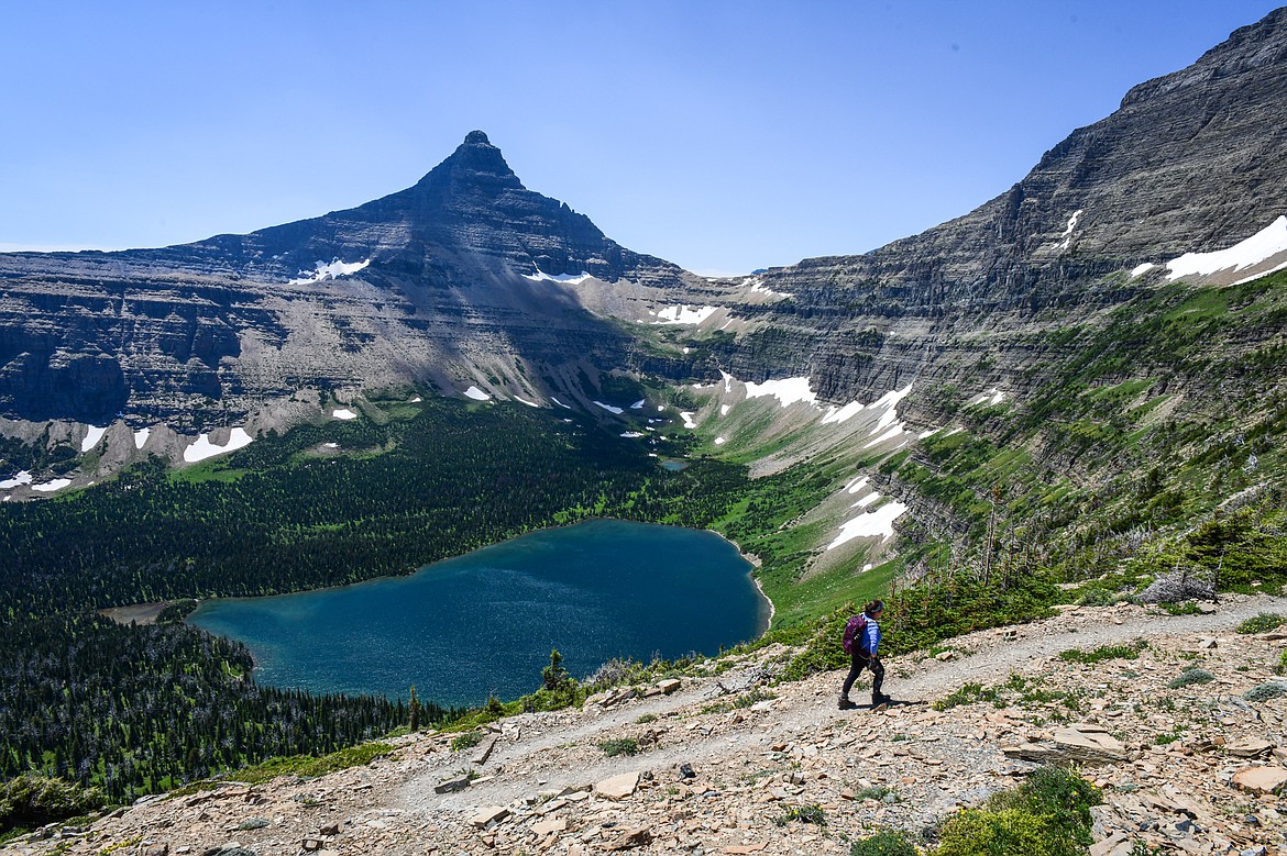 A hiker ascends the switchbacks above Oldman Lake to Pitamakan Pass in Glacier National Park on Sunday, July 14. (Casey Kreider/Daily Inter Lake)