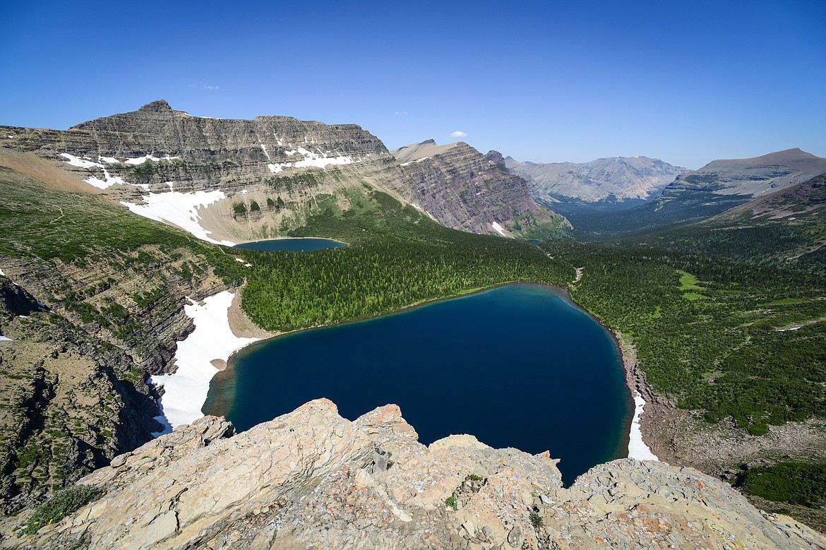 PItamakan Lake, Lake of the Seven Winds and a sliver of Morning Star Lake from Pitamakan Pass in Glacier National Park on Sunday, July 14. (Casey Kreider/Daily Inter Lake)