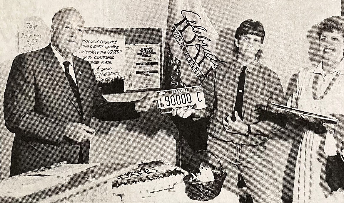 In 1989, Centennial Commission Chairman Harry Magnuson presented the 90,000th centennial license plate to Brett Gundle and his mother, Cathie.