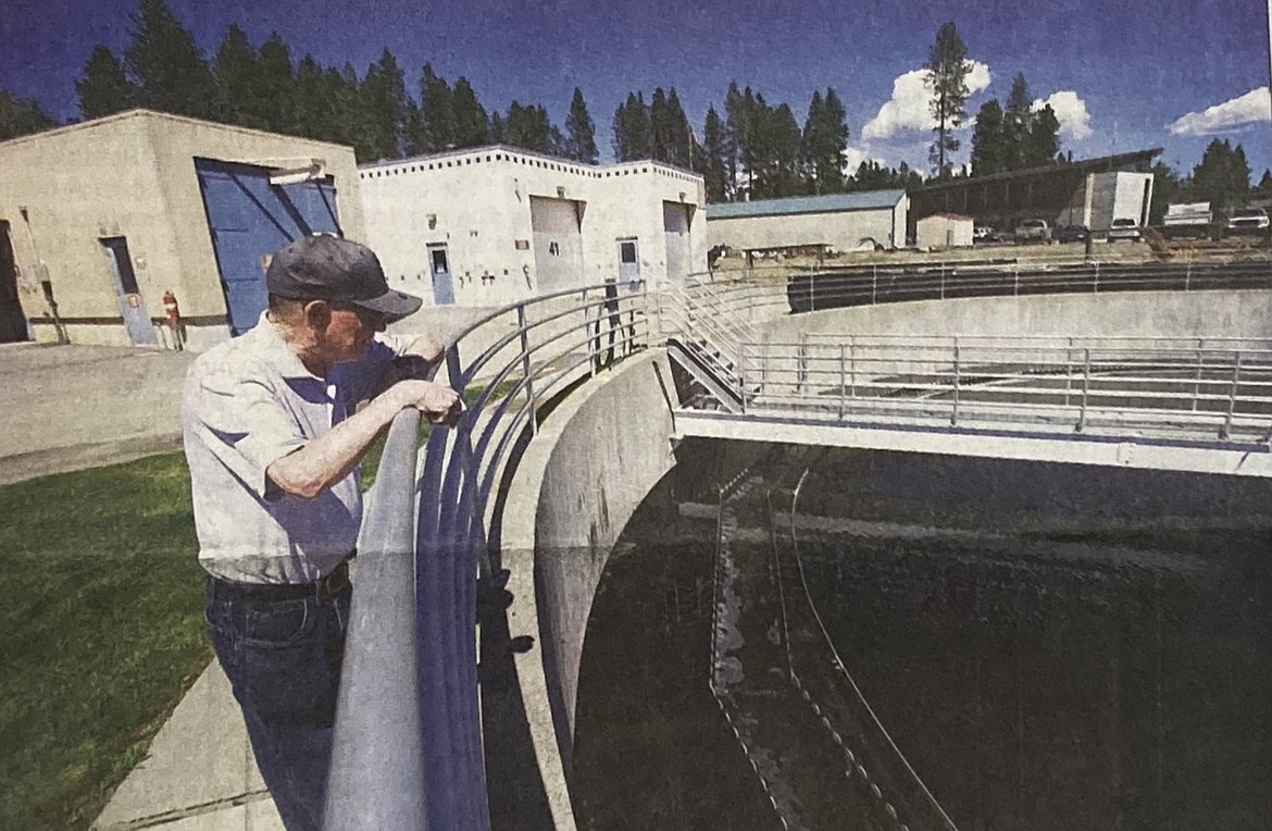 In 2014, Director Sid Fredrickson examined filtered water at the Coeur d’Alene wastewater treatment plant.