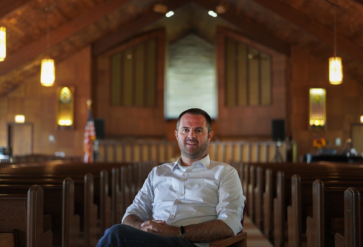 Pastor Ryan Burge, an associate professor of political science at Eastern Illinois University and author of "The Nones," poses for a portrait at at First Baptist Church in Mt. Vernon, Ill., Sept. 10, 2023.