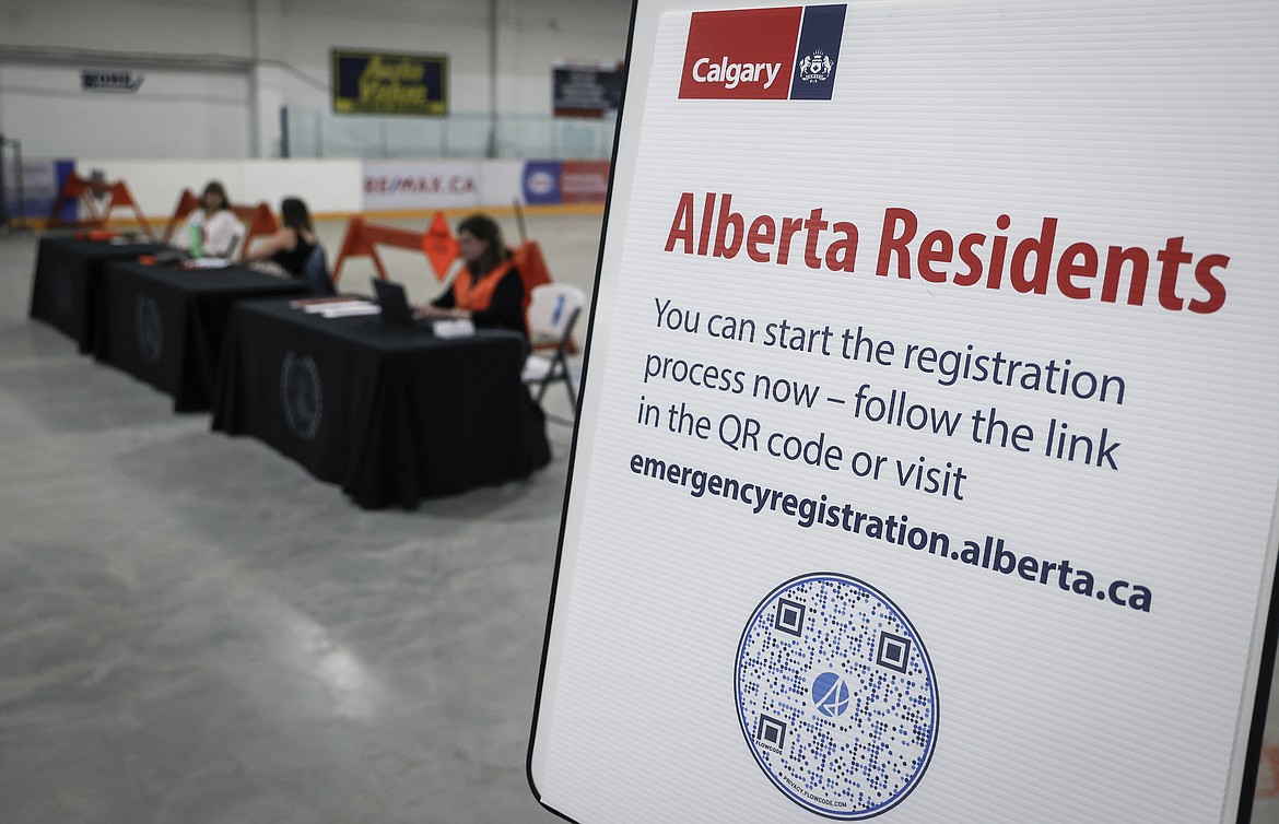 A reception center is readied for wildfire evacuees forced from Jasper National Park in Calgary, Alberta, Canada, Tuesday, July 23, 2024. (Jeff McIntosh/The Canadian Press via AP)