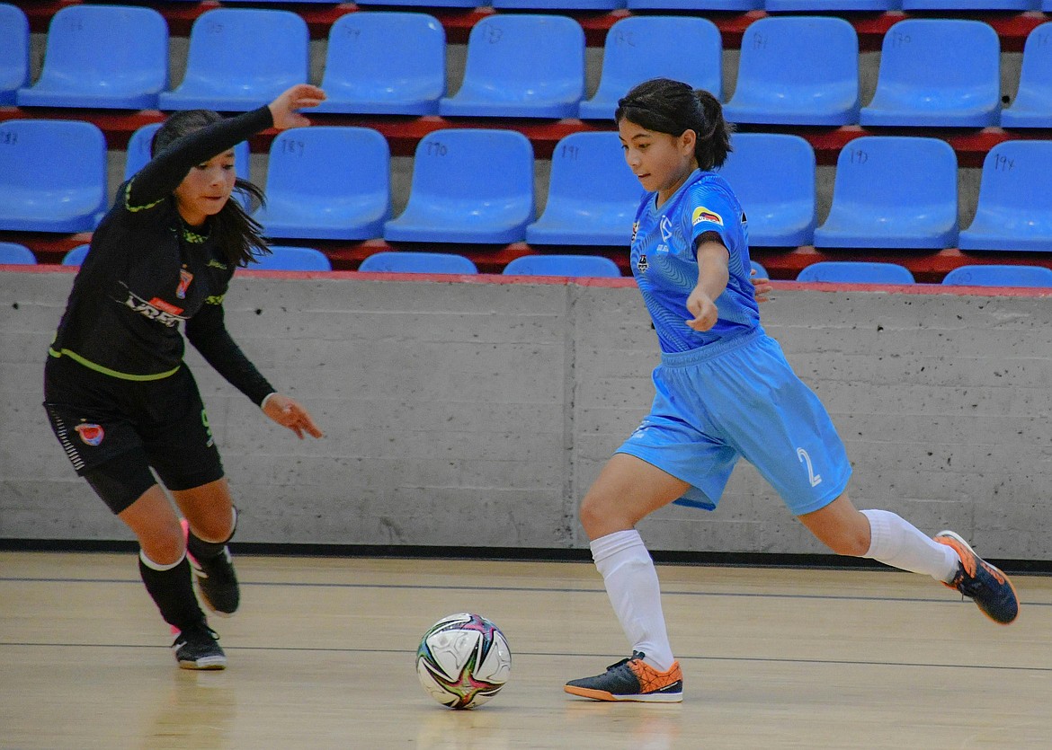 Two girls play futsal in Cali, Colombia. The sport is especially popular in South America, but is played around the world.