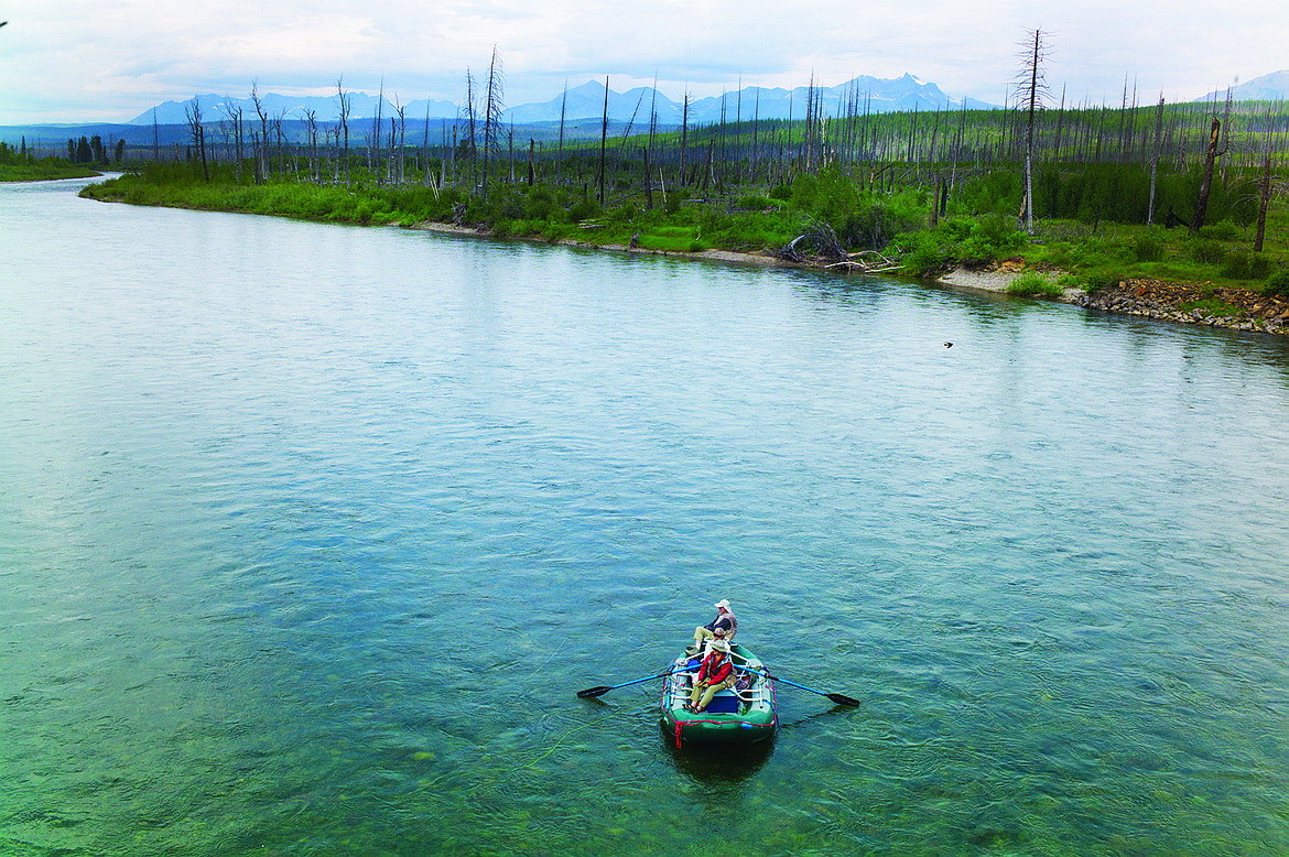 A fishing party floats the North Fork of the Flathead near Glacier National Park in this file photo. (Chris Peterson/Hungry Horse News FILE)