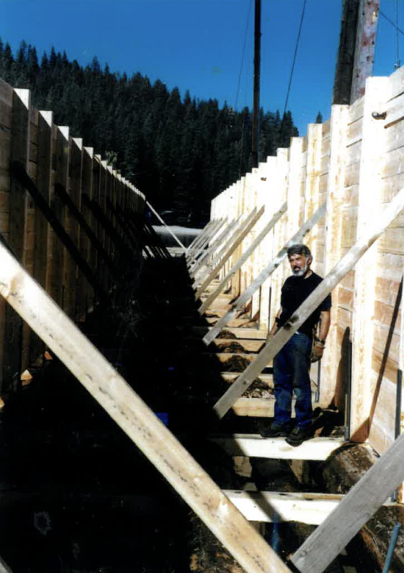 Skip Murphy's late brother Loren Murphy is seen with pieces of The Coeur d'Alene Resort Boardwalk Marina, which he and his brother constructed in the mid-1980s. “It’s upside down right now,” Skip said, pointing to the photo. "We built them upside down and then you flipped them over because you couldn’t do any of this work underwater.”