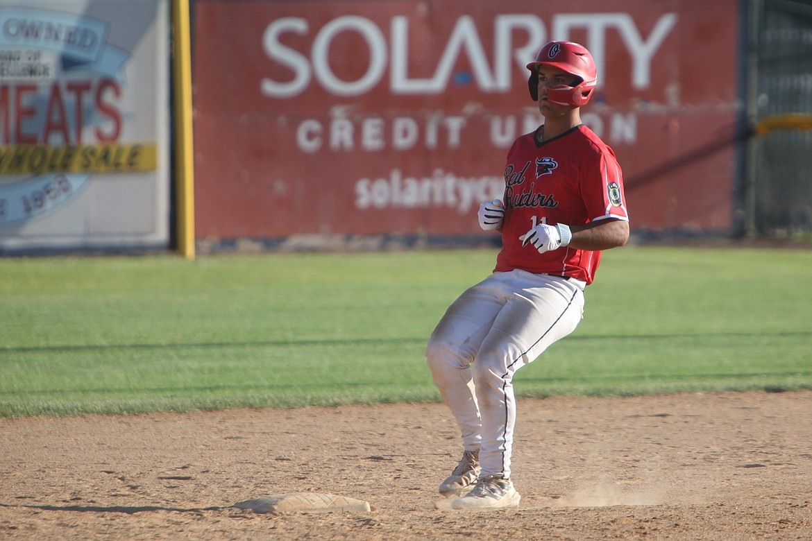 Red Raider shortstop Sonny Salazar reaches second base after hitting a double against Walla Walla in the AA Area 4 district tournament last weekend Salazar led the Red Raiders in both hits and RBI this summer.