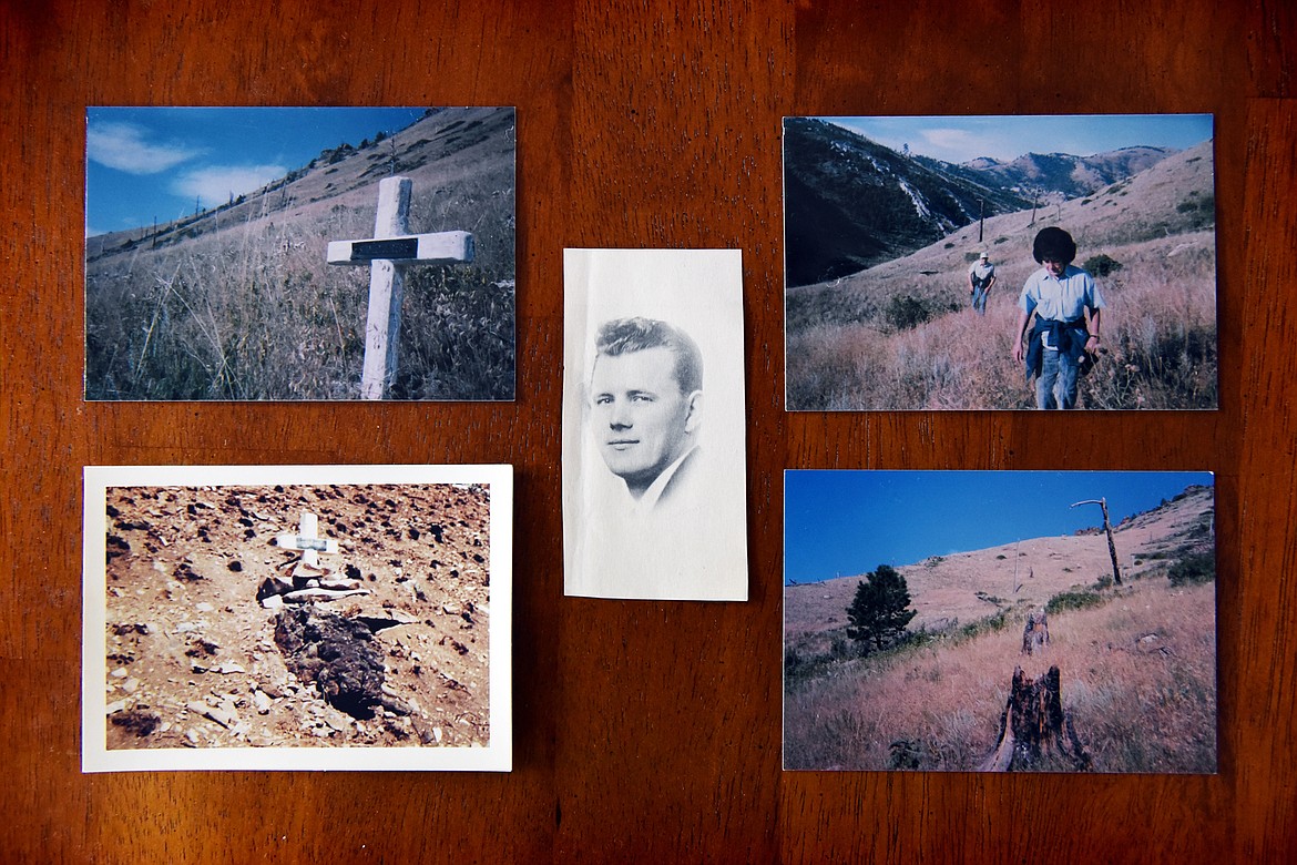 After Andre Nagel Anderson and her husband, Ronald, moved to Kalispell they made a pilgrimage in 1999 to Mann Gulch and took photographs of Stanley Reba's cross and the cross of his friend, Joe Sylvia. Andre Anderson said the climb to the site was arduous but meaningful for her. (Casey Kreider/Daily Inter Lake)