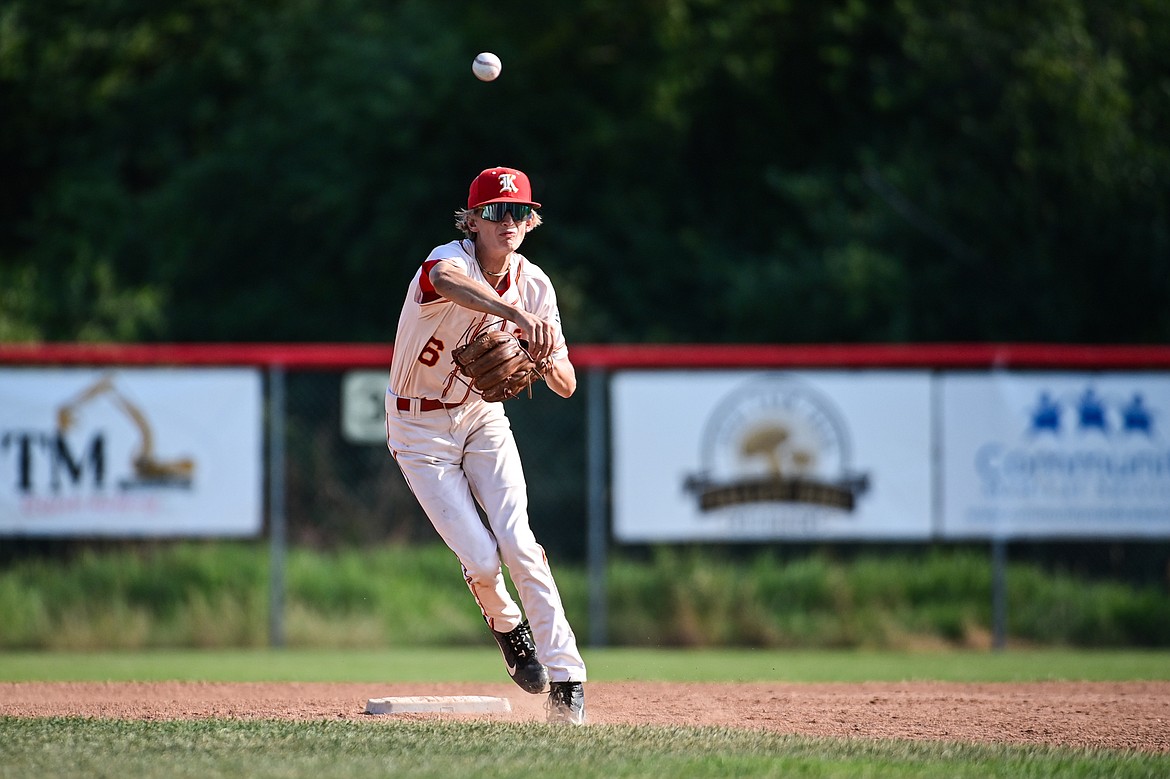 Kalispell shortstop Kaden Drish (6) fires to first for a double play against Great Falls at Griffin Field on Friday, July 26. (Casey Kreider/Daily Inter Lake)