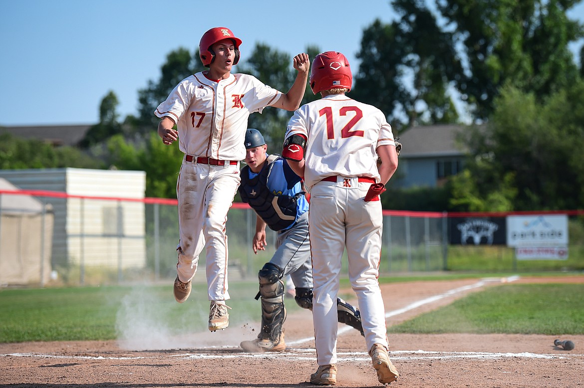 Kalispell's Bryce Buckmaster (17) scores from third on a sacrifice fly by Carter Schlegel in the second inning against Great Falls at Griffin Field on Friday, July 26. (Casey Kreider/Daily Inter Lake)