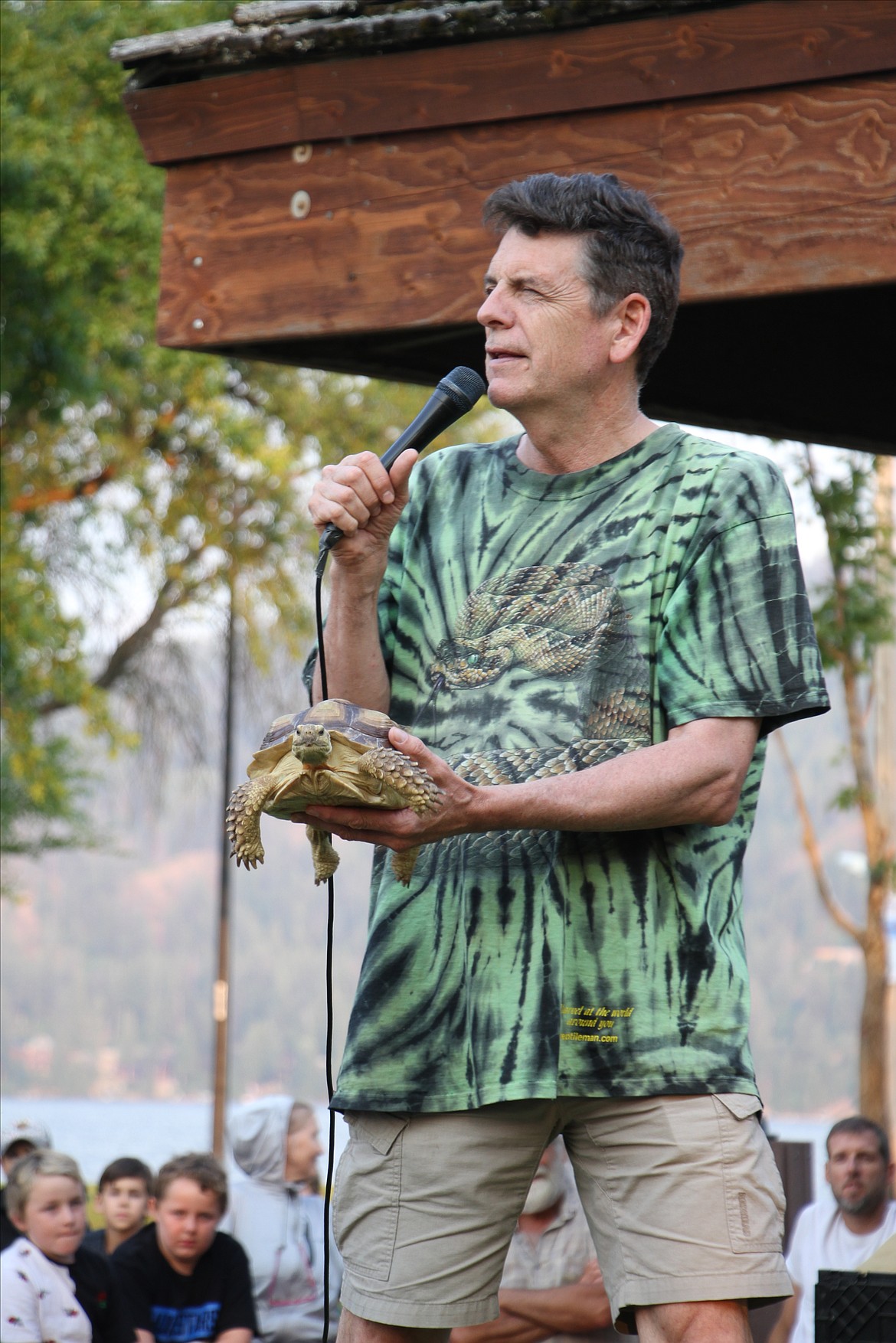 Peterson shows spectators "Shelly," an African spurred tortoise.