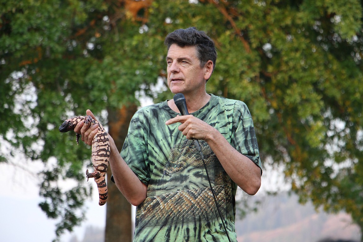 Peterson shows spectators "Sheila," a venomous Gila monster lizard.