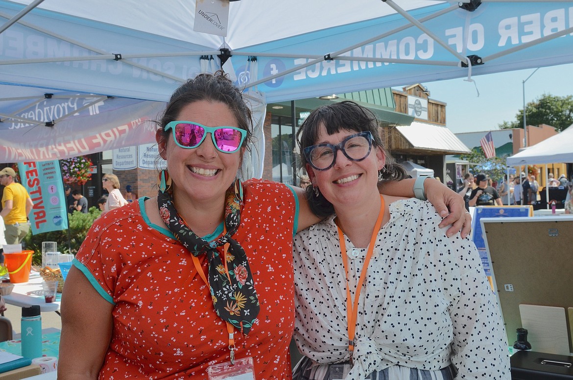 Co-conspirators Carol Lynn Lapotka and Courtney Blazon organized this year's Flathead Cherry Festival, in partnership with the Polson Chamber of Commerce. (Kristi Niemeyer/Leader)