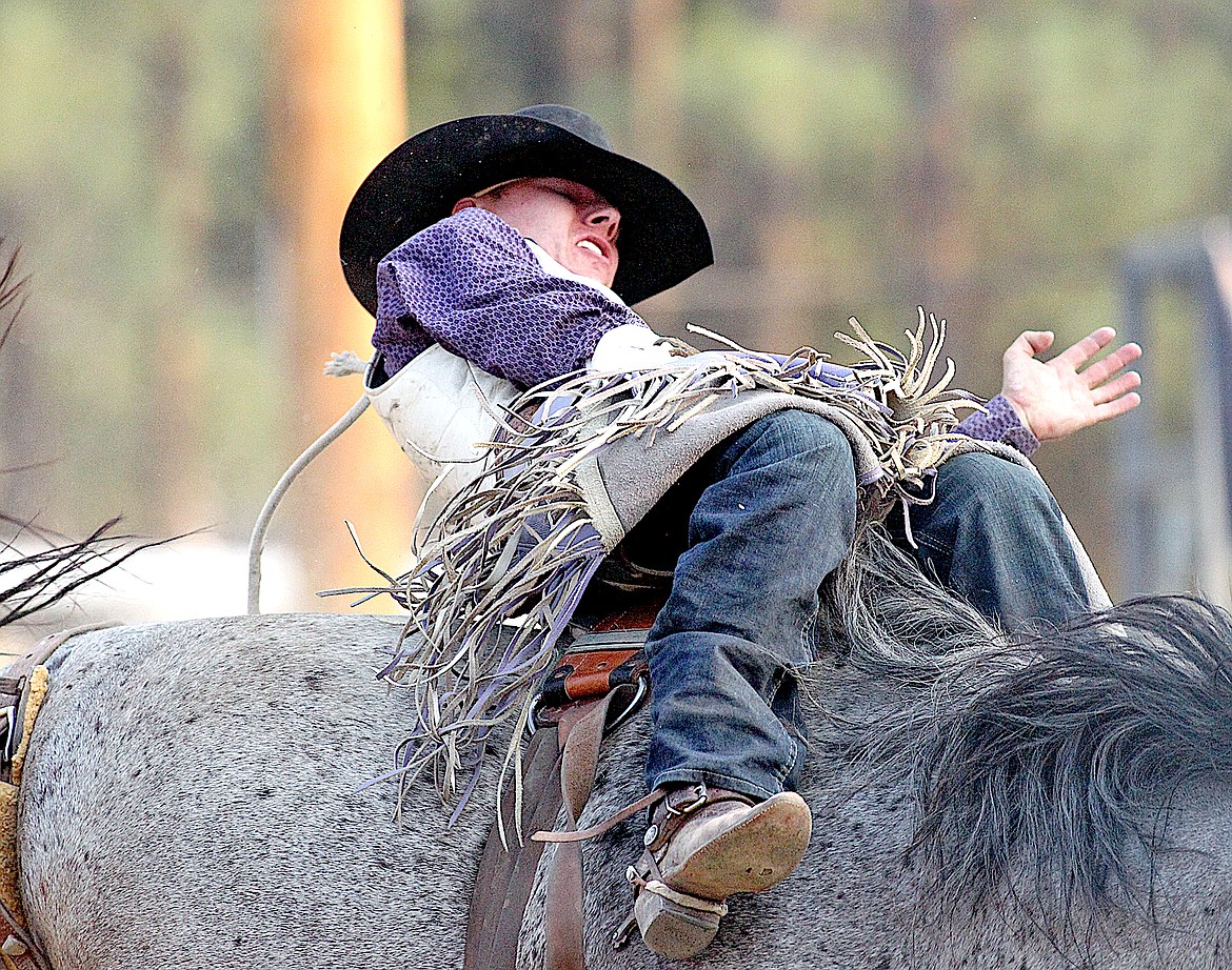 Hayden James of Emmett, Idaho scored a 68 on the horse known as American Dream in the bareback riding event Saturday, July 27, 2024, at the Kootenai River Stampede. (Paul Sievers/The Western News)