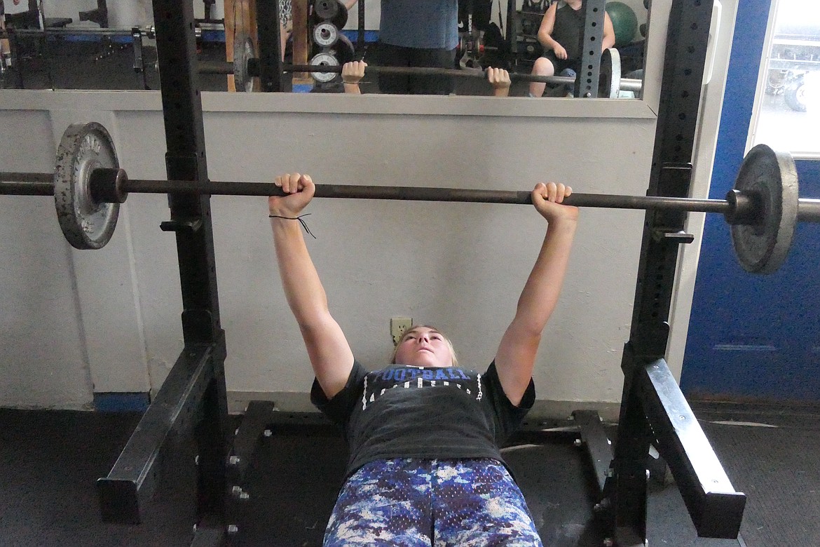 Junior Sarah Koskela works out in the weight room at T Falls High getting ready for the upcoming high school sports season. (Chuck Bandel/VP-MI)