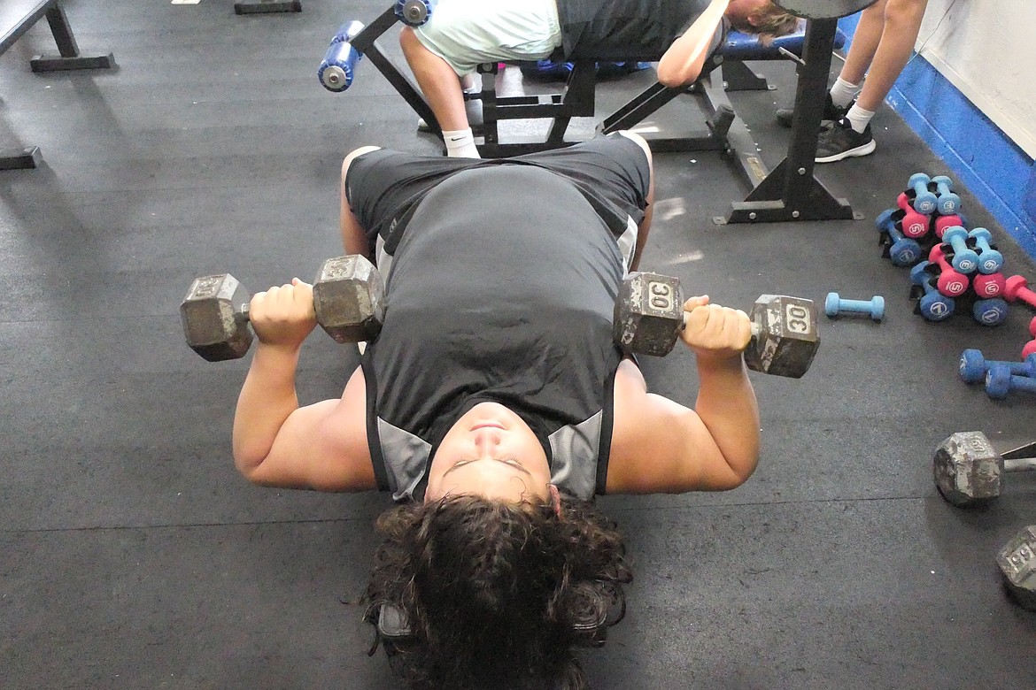 Offensive lineman Jacob Wood works on his overall strength and conditioning during a voluntary conditioning session this past week at Thompson Falls HIgh.  (Chuck Bandel/VP-MI)