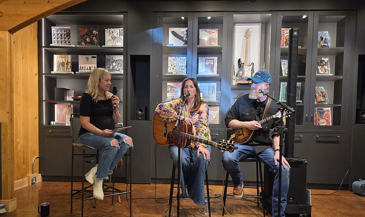 Songwriters Jo Smith, Stephanie Chapman and three-time Grammy winner Nathan Chapman performing at Slow Burn Records in Whitefish. (Photo Credit: Cari Klepper)