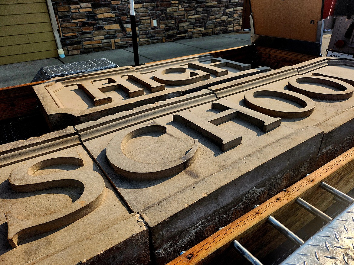 The cement blocks are preserved from the 1910 Coeur d’Alene High School building on Seventh Street.