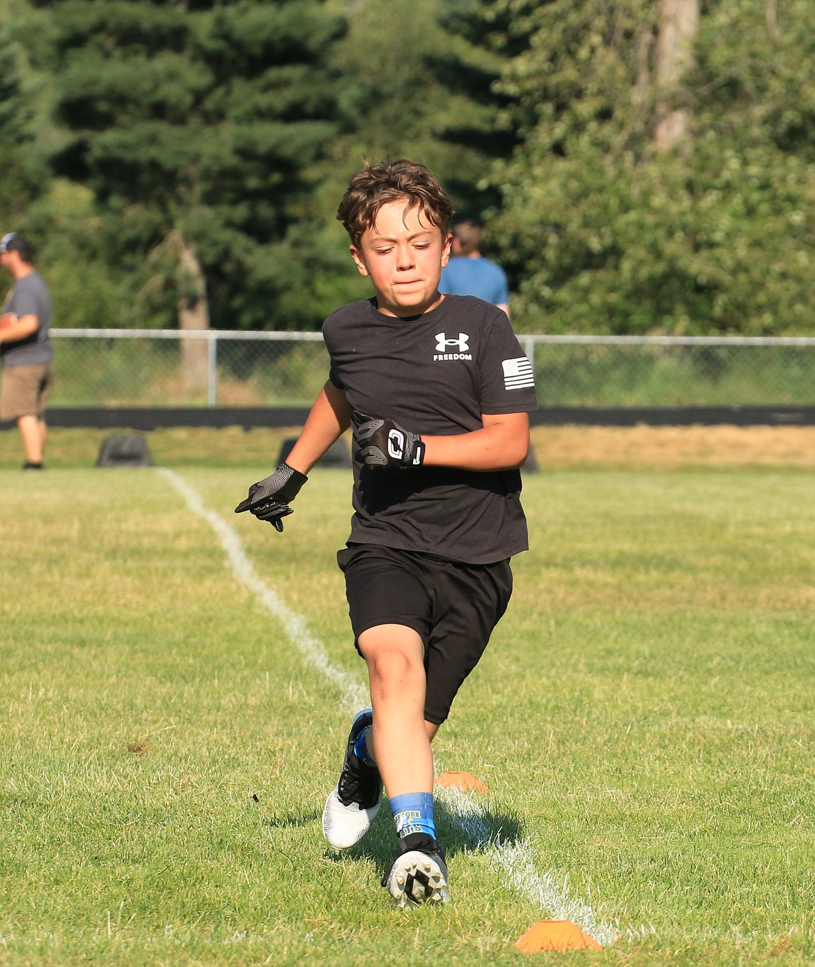 Clark Fork rising eighth grader Jesse Mintken participates in a square shuffle drill.