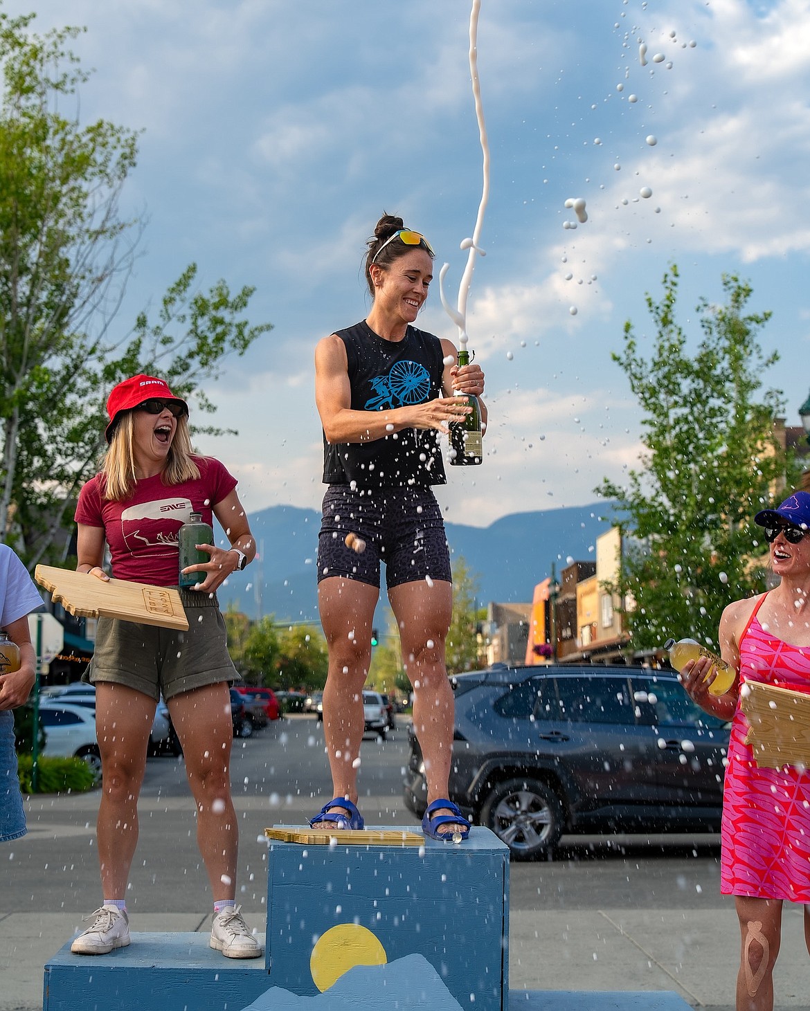 Stella Hobbs celebrates atop 'The Mountain Goat' race's podium at the conclusion of the Last Best Ride Sunday. (Drew Silvers Photo)