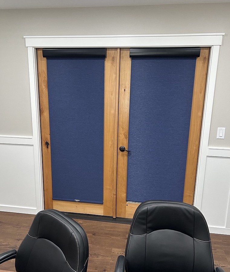 These door blinds from Blinds for Any Budget maintain privacy for a conference room at a local law office.