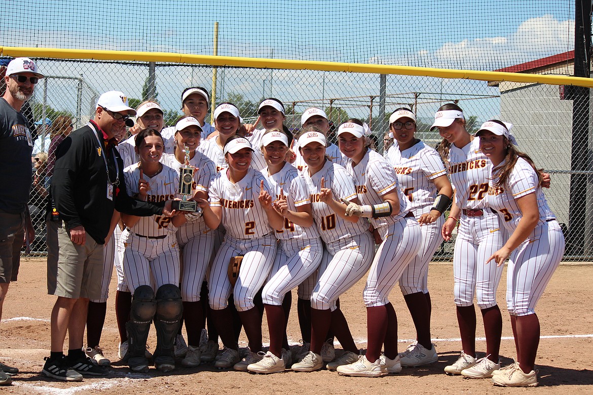 Moses Lake High School softball players pose with their district championship trophy in May. The “Hourathon” fundraiser Monday is designed to help fund Moses Lake School District activities in the wake of the failure of the Educational Programs and Operations levy that typically funds extracurricular activities.