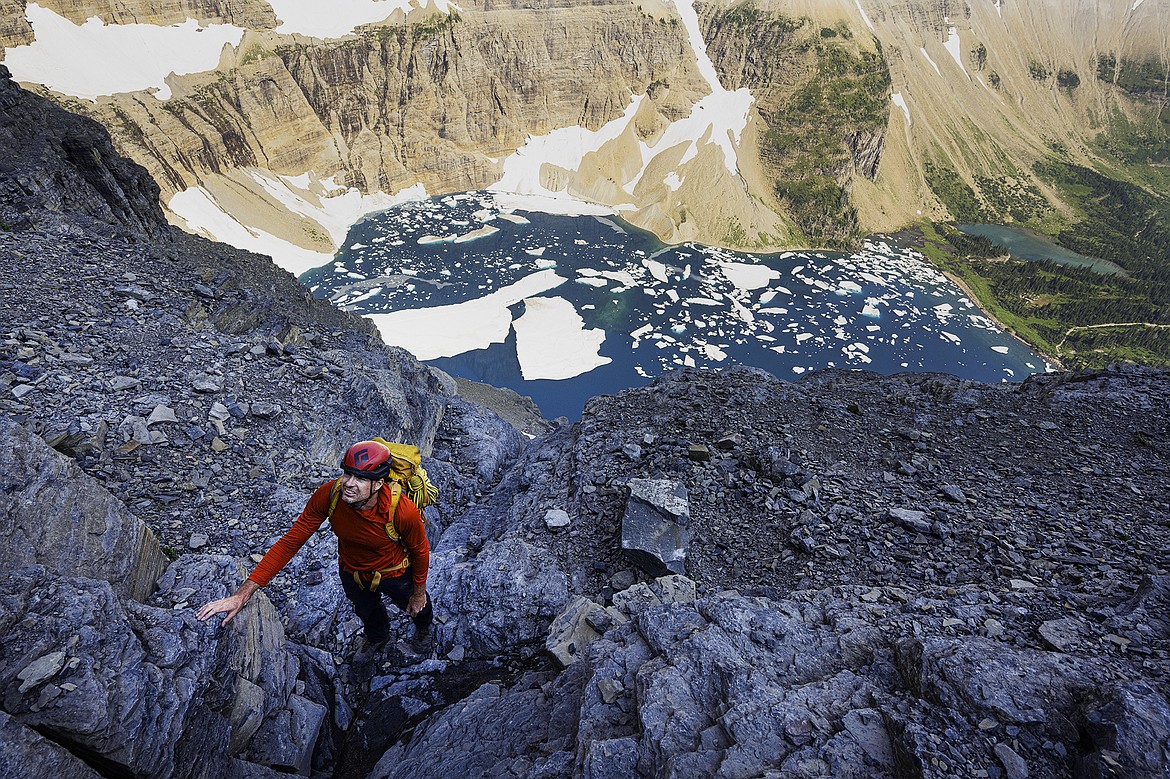 Adam Clark, of Whitefish, ascends The North Face of Mount Wilbur above Iceberg Lake in Glacier National Park. Seth Anderson Photo.