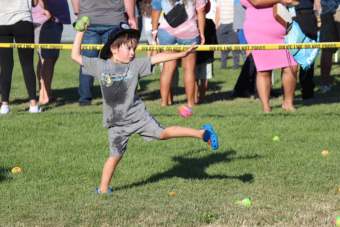 The substitute game for water balloons drew plenty of players at last year’s Quincy Police Department National Night Out. This year’s event is on Monday.