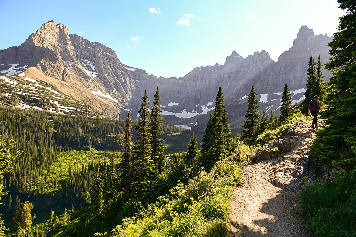 A hiker ascends the Iceberg-Ptarmigan Trail in Many Glacier in Glacier National Park on Sunday, July 7. (Casey Kreider/Daily Inter Lake)