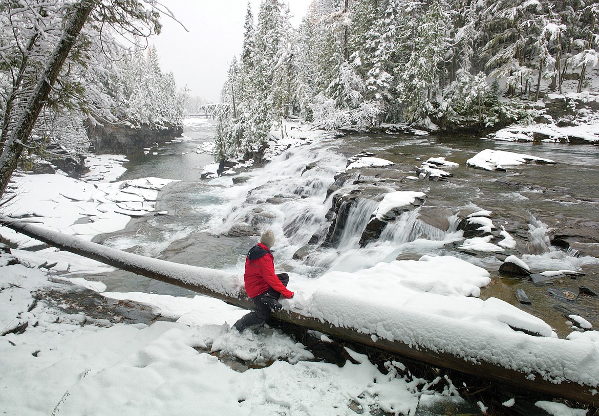 Looking over a snowy McDonald Falls in Glacier National Park in this file photo.