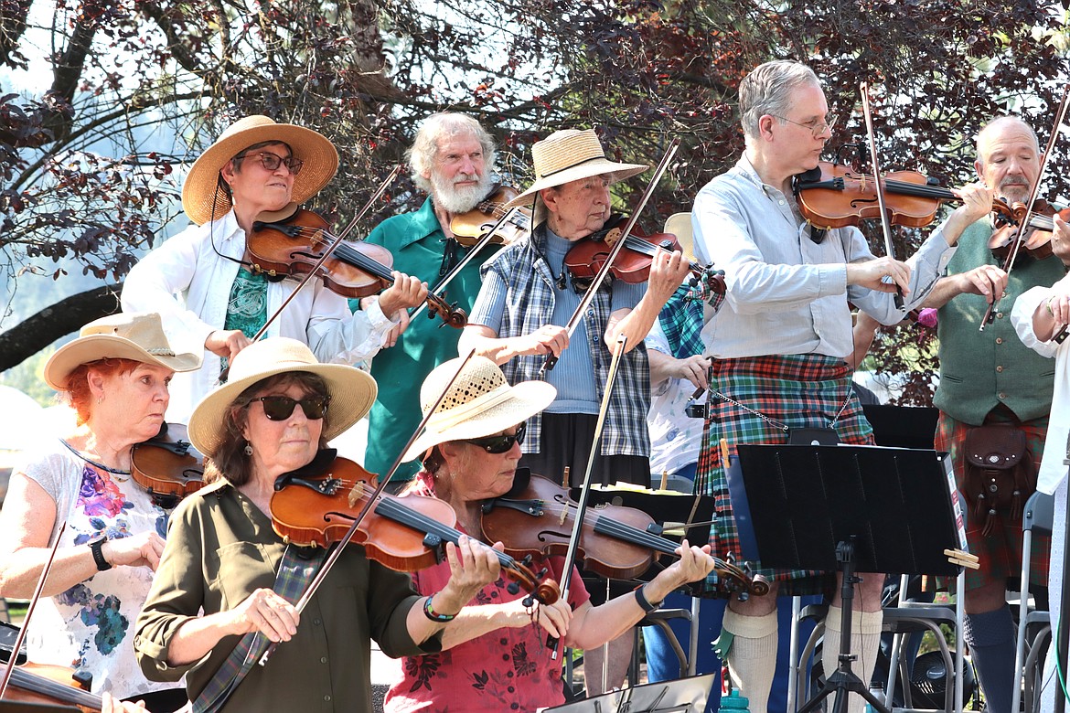 The Scottish Fiddlers perform at Art on the Green on Friday.