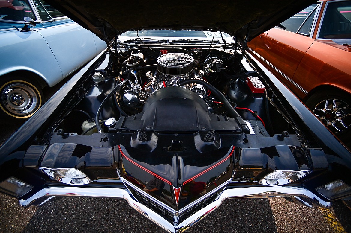 Under the hood of a 1972 Pontiac Grand Prix at the Evergreen Show 'N Shine at Conlin's Furniture on Saturday, Aug. 3. (Casey Kreider/Daily Inter Lake)