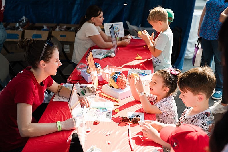 Children learn at a display at the Oregon Museum of Science and Industry Science Festival. OMSI, one of the largest science museums in the Northwest, will bring its traveling children’s exhibit to the Othello Public Library Aug. 19.