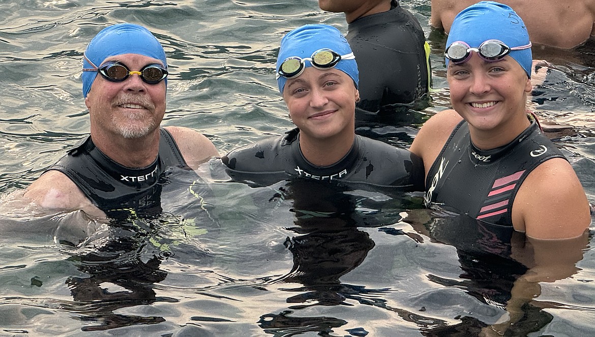 Courtesy photo
Kip Taylor and daughters Quinn and Riley Taylor of the Coeur d'Alene Area Swim Team competed in the Long Bridge Swim last Saturday in Sandpoint. Kip was the top finisher in the Male 50-54 age group at 44 minutes, 37 seconds, while Riley was the top finisher in the Female 15-19 age group at 40:42.