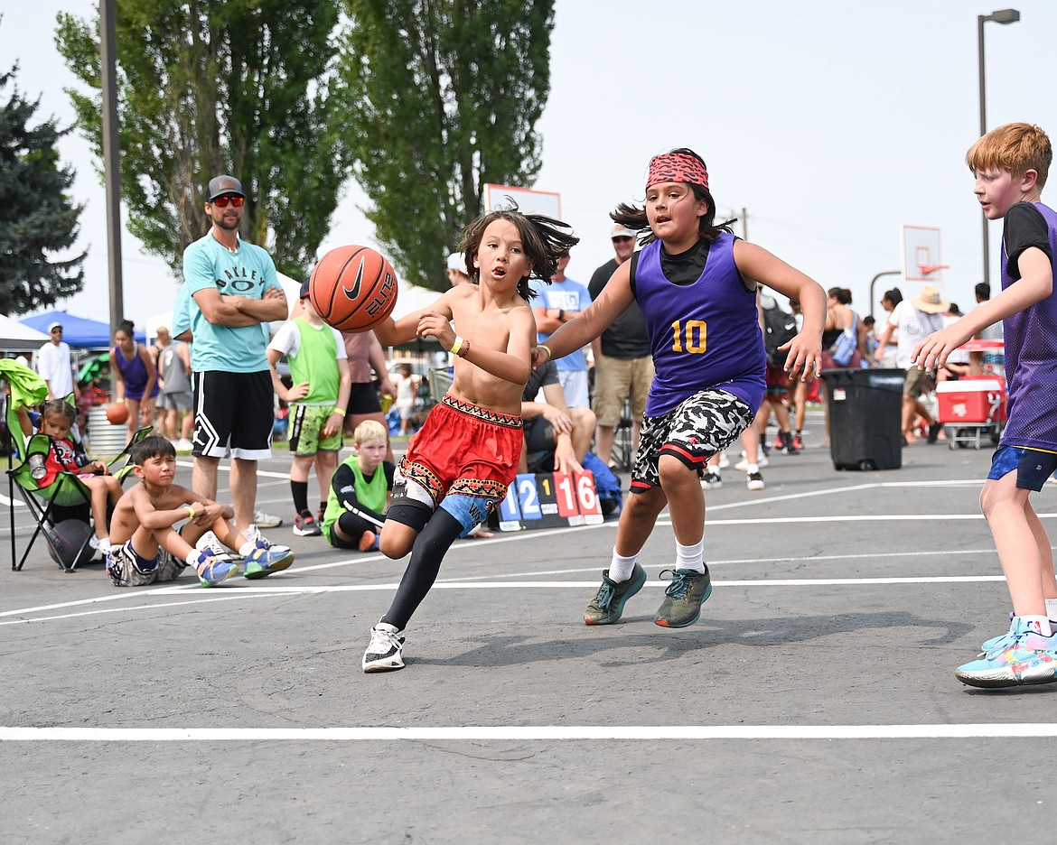 Javin Pitts angles for the hoop during the Ronan Pioneer Days 3-on-3 Jamboree last Saturday. (Christa Umphrey photo)