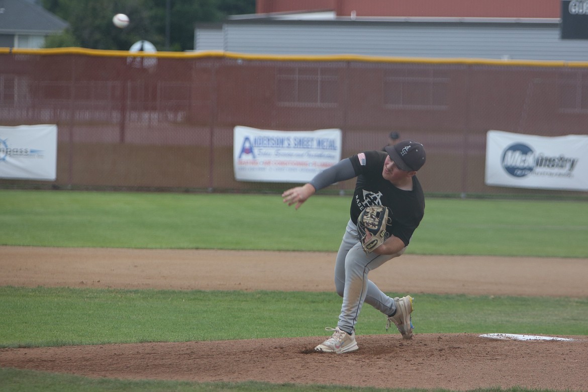 Almira/Coulee-Hartline pitcher Carter Pitts releases a pitch during a game against Spokane Valley at the AA state tournament last week. Pitts was one of eight Warrior pitchers that started games this summer.