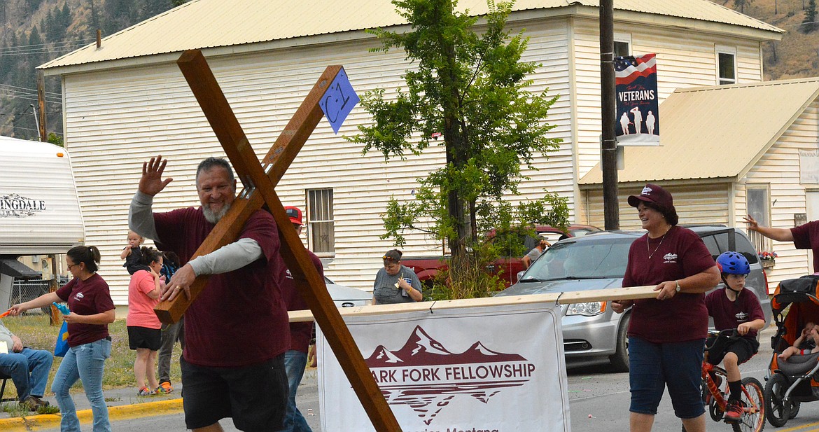 Clark Fork Fellowships parade entry included a large wooden cross that was wheeled from one end of the parade to the other. (Mineral Independent/Amy Quinlivan)