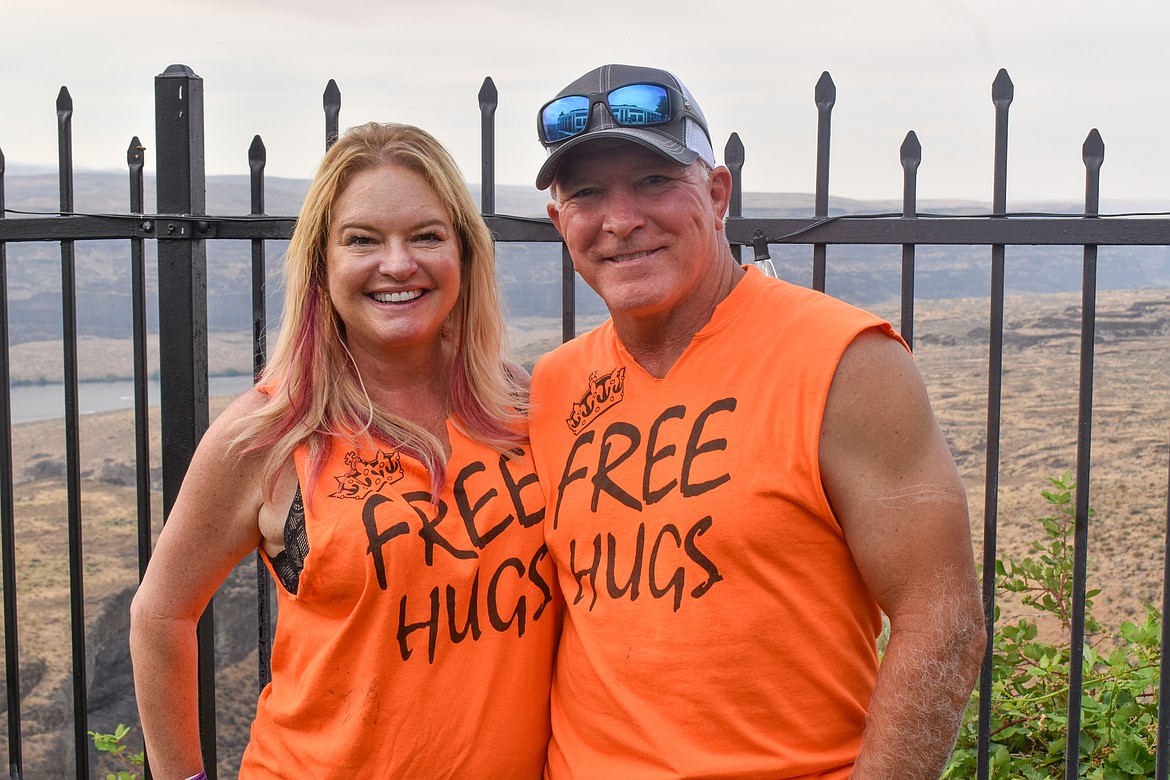 Connie and Rick Mianecki wearing their “Free Hugs” shirts at Watershed this year in honor of their son Trevor who passed away in 2017.