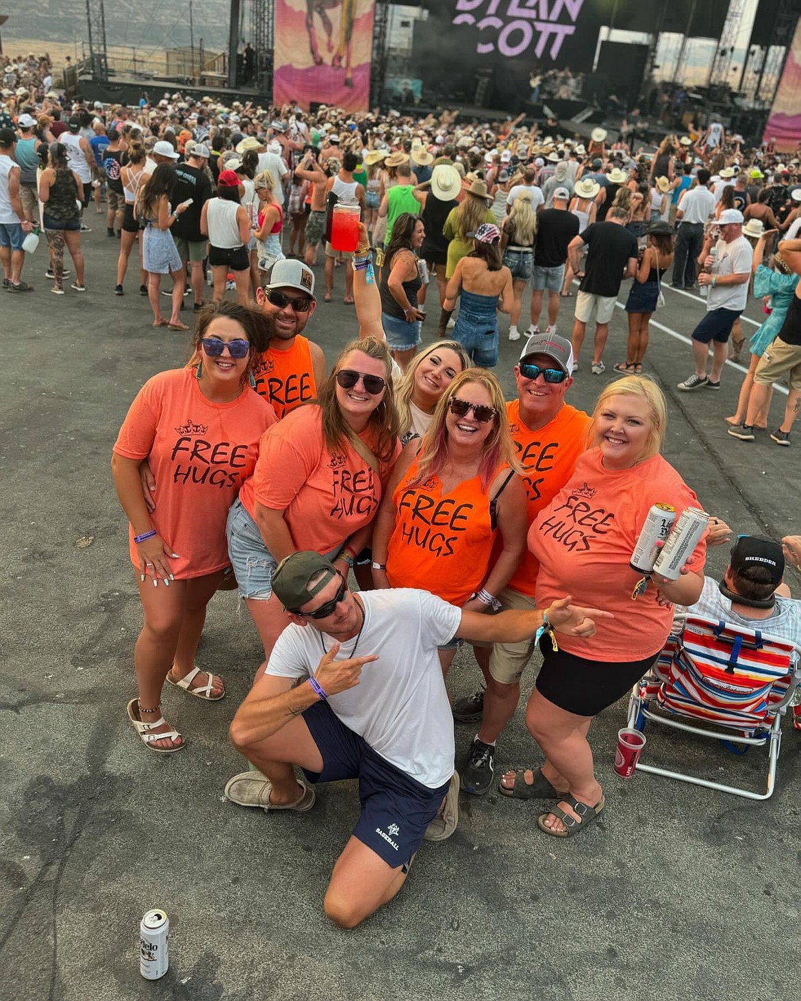 Trevor’s family and friends carry on his memory by attending Watershed wearing custom orange shirts that say “Free Hugs”.