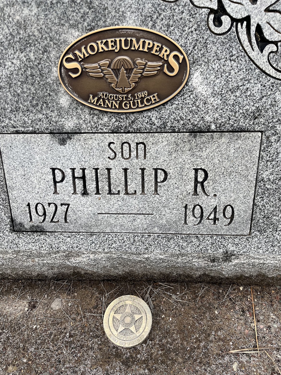 An emblem commemorating Phillip McVey's death at Mann Gulch in 1949 was recently added to his grave marker in the Ronan Cemetery. (Kristi Niemeyer/Leader)