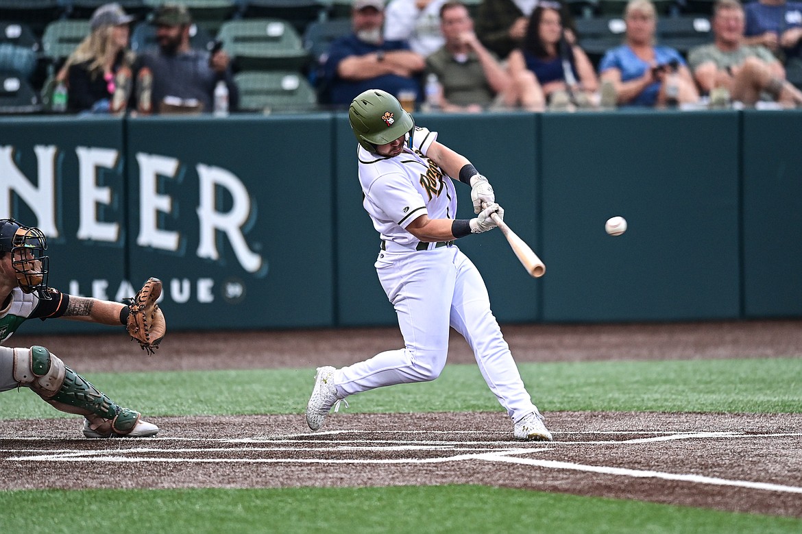 Glacier's River Orsak (9) singles in the fifth inning against the Missoula Paddleheads at Glacier Bank Park on Tuesday, Aug. 6. (Casey Kreider/Daily Inter Lake)