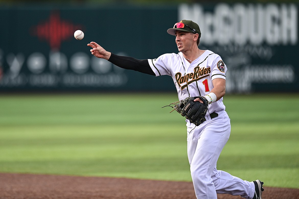 Glacier second baseman Christian Kirtley throws to first base for an out against the Missoula Paddleheads at Glacier Bank Park on Tuesday, Aug. 6. (Casey Kreider/Daily Inter Lake)