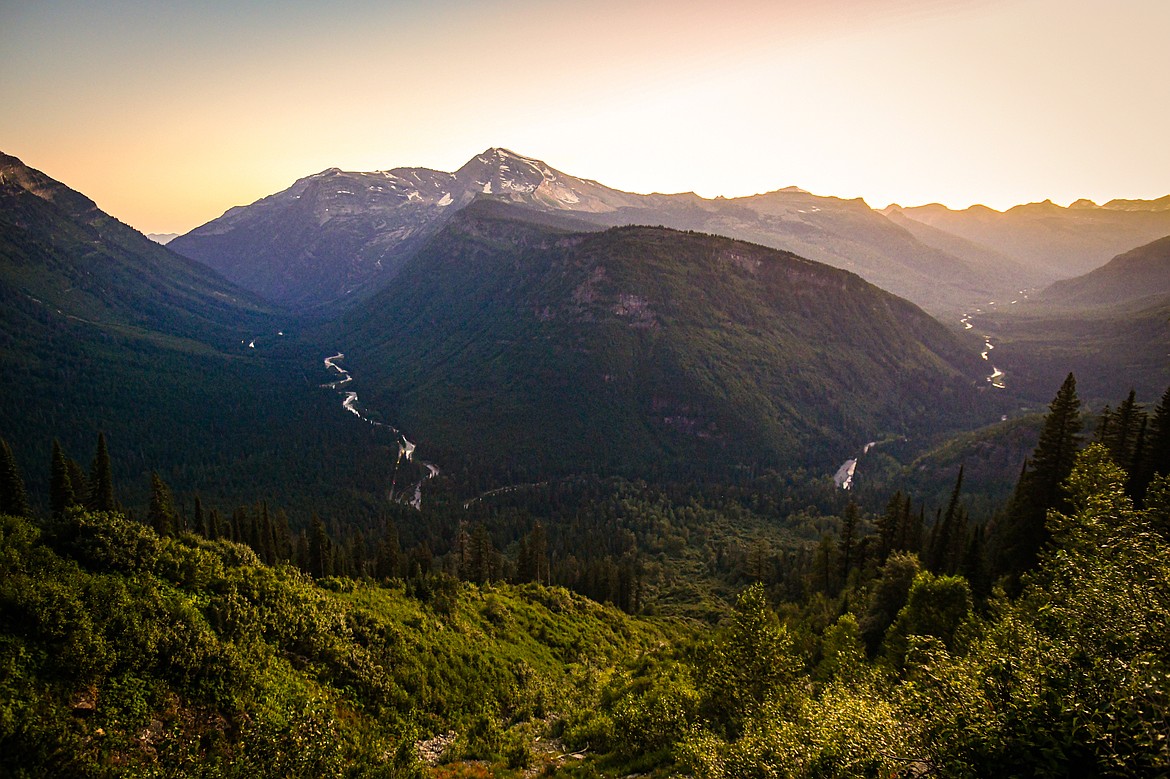 The sun sets behind Heavens Peak from the Going to the Sun Road in Glacier National Park on Thursday, Aug. 1. (Casey Kreider/Daily Inter Lake)