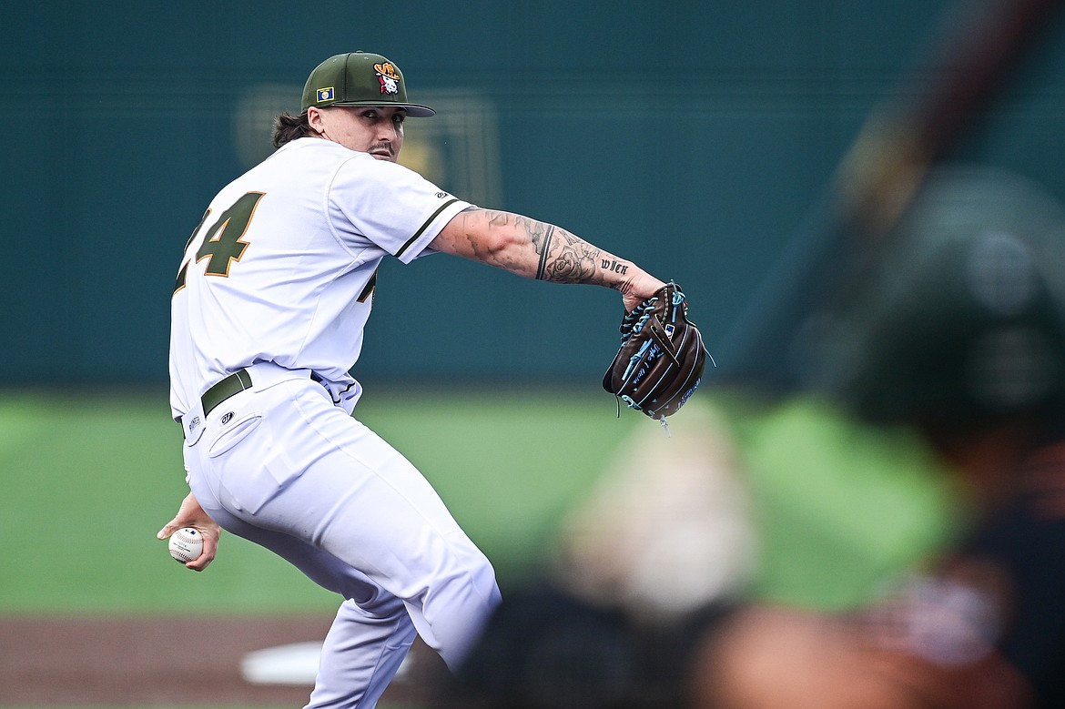 Glacier starting pitcher Patrick Wicklander (24) delivers in the first inning against the Missoula Paddleheads at Glacier Bank Park on Tuesday, Aug. 6. (Casey Kreider/Daily Inter Lake)