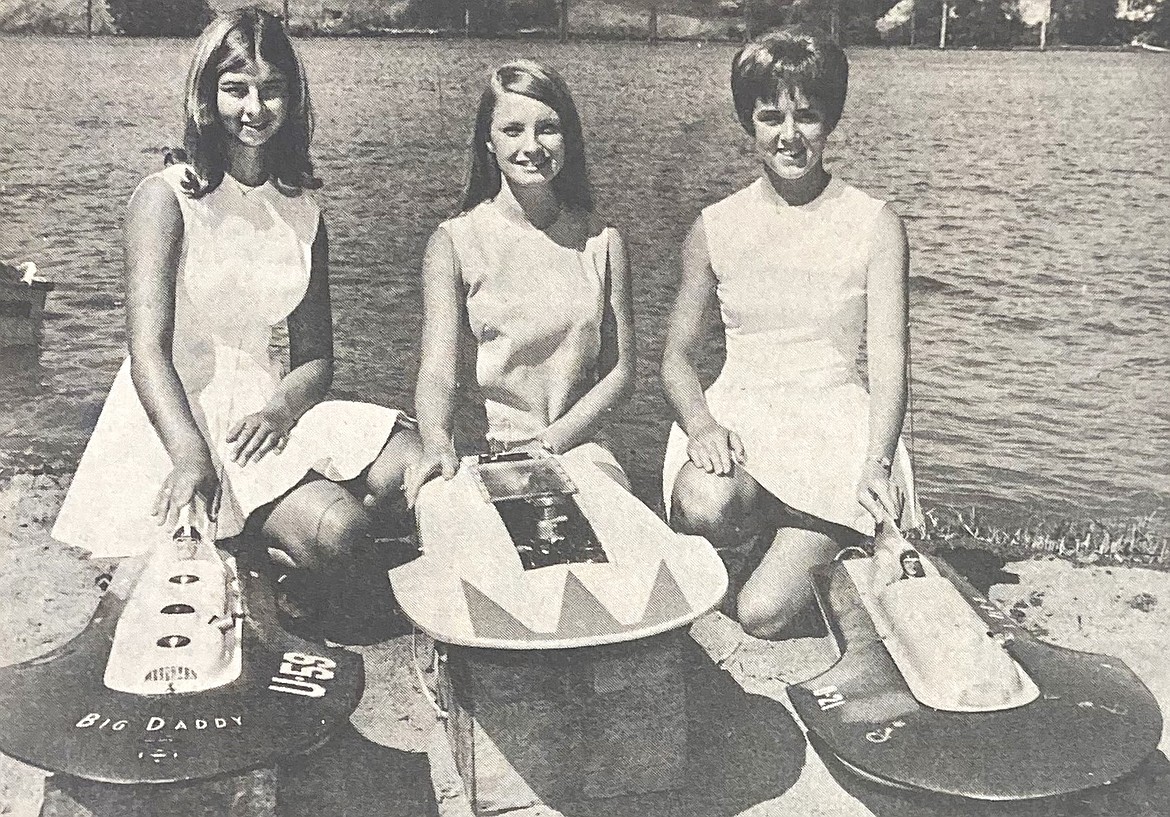 In 1969, Miss Coeur d’Alene VI Betsy Darling, center, and Coeur d’Alene Vikettes Sue O’Connel, left, and Jean Nelson displayed model hydroplanes prior to the Miniature Diamond Cup.